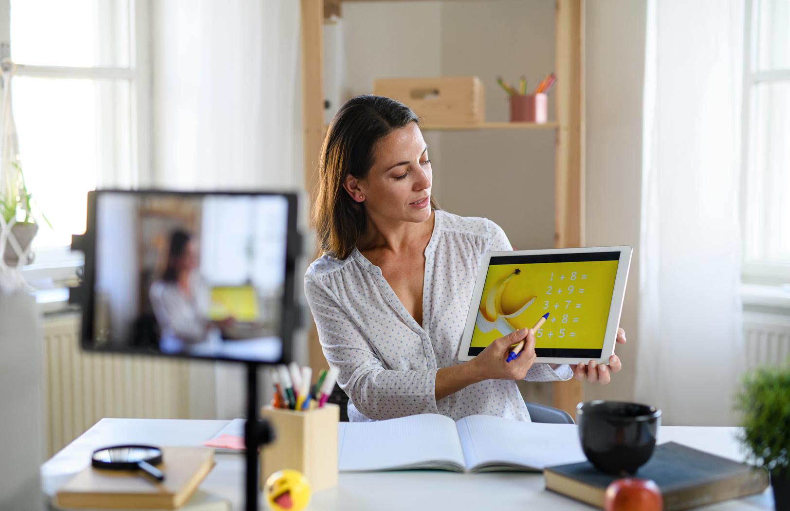 Woman teacher teaching online,coronavirus and online distance